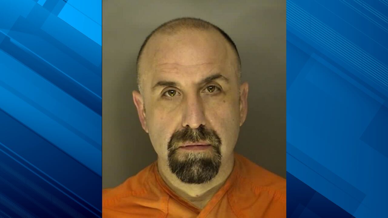 Former Myrtle Beach detective accused of pointing gun at officer over microwaved fish