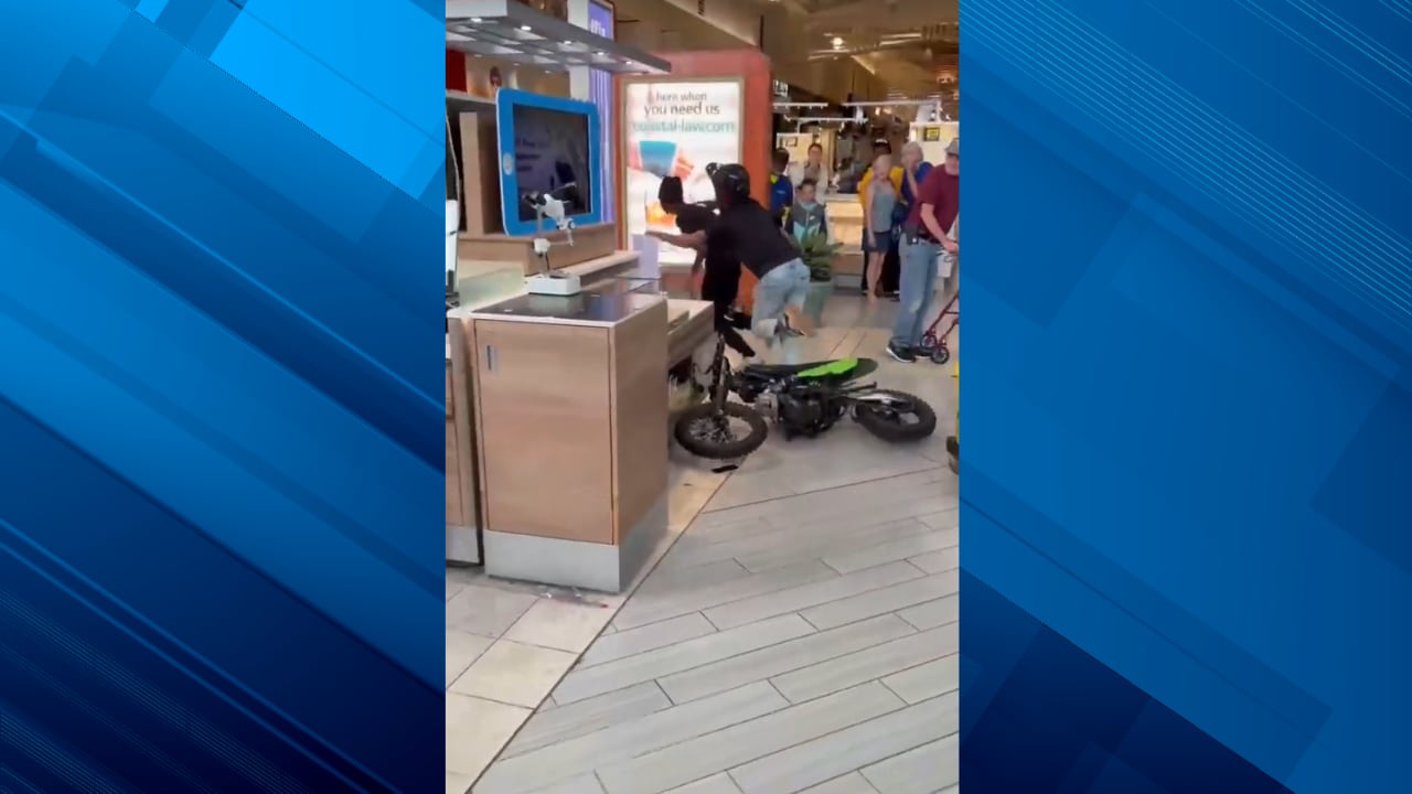 Watch: Teens taken into custody after riding dirt bike through Coastal Grand Mall