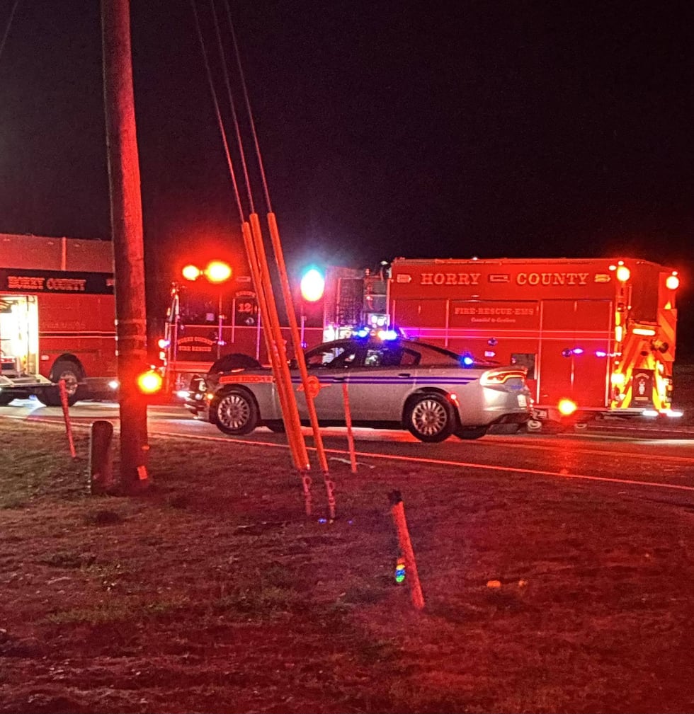 HCFR: 1 hurt after car hits parked vehicle, home off Highway 90 in Horry County