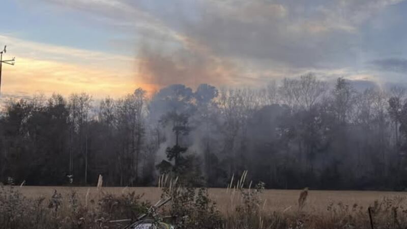 Crews work to contain outside fire in Conway