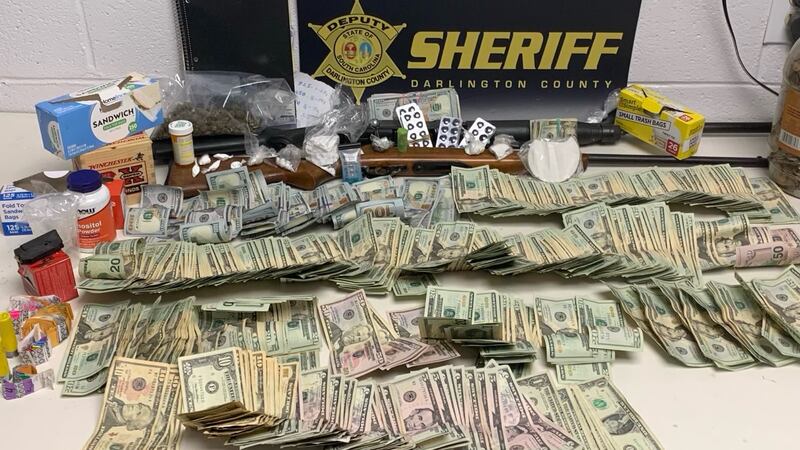 An arrest was made in Darlington County after cash, drugs and guns were found during a search...