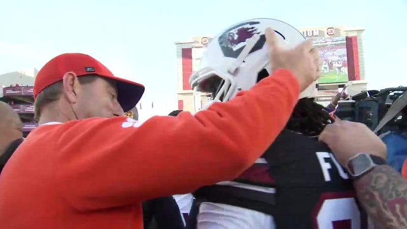WATCH: Clemson Coach Dabo Swinney defuses Palmetto Bowl postgame pushing, shoving following...