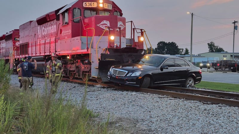 A crash involving a train and a car has closed East Cox Ferry Road in Conway.