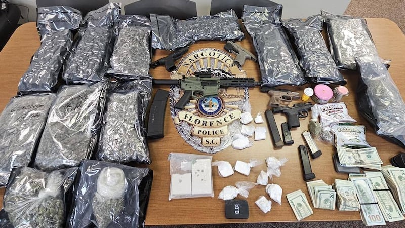 Drugs and guns seized after search of Florence home; 2 arrested